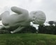 A giant floating baby among futuristic metal trees - welcome to Singapore!